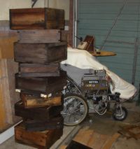 John dissapears behind boxes